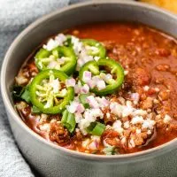 Chili with ground beef in a bowl.