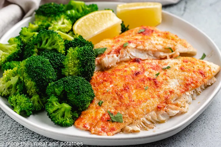 Baked flounder with lemon garlic and butter with blanched broccoli.