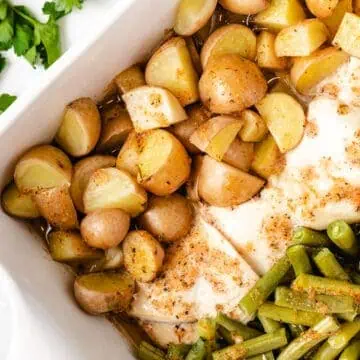 Top down view of potatoes with chicken.