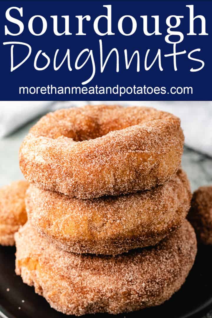Stack of three sourdough donuts on a plate.