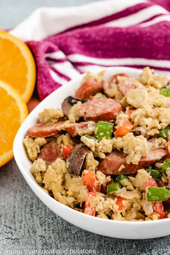 Sausage egg scramble with oranges.