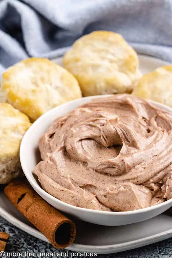 Butter with cinnamon in a gray dish.