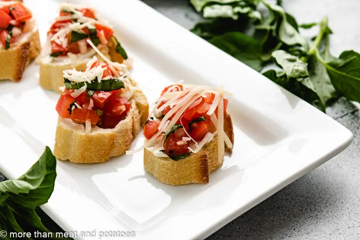 Pieces of bruschetta with cream cheese.