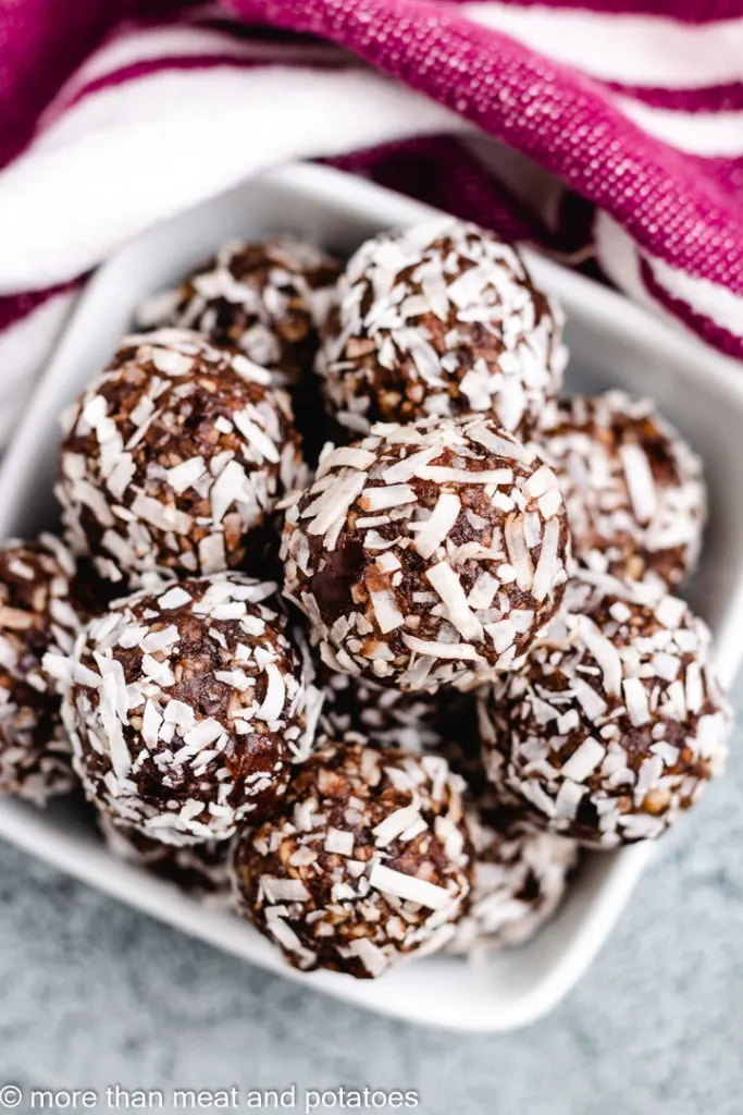 Top down view of coconut date balls.