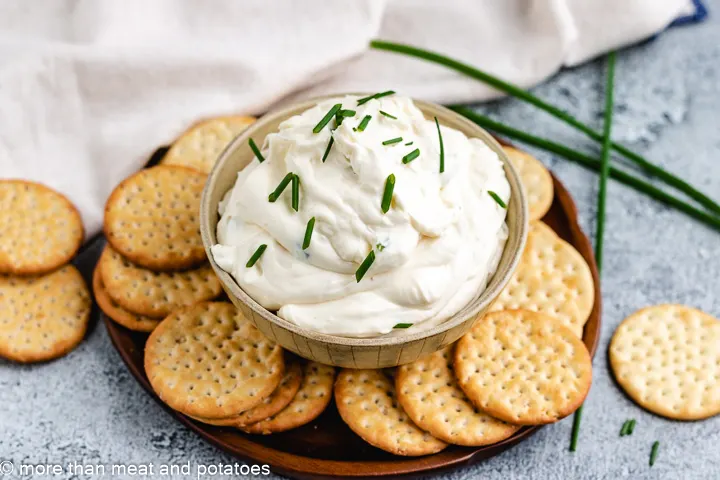 Garlic dip topped with chopped chives.