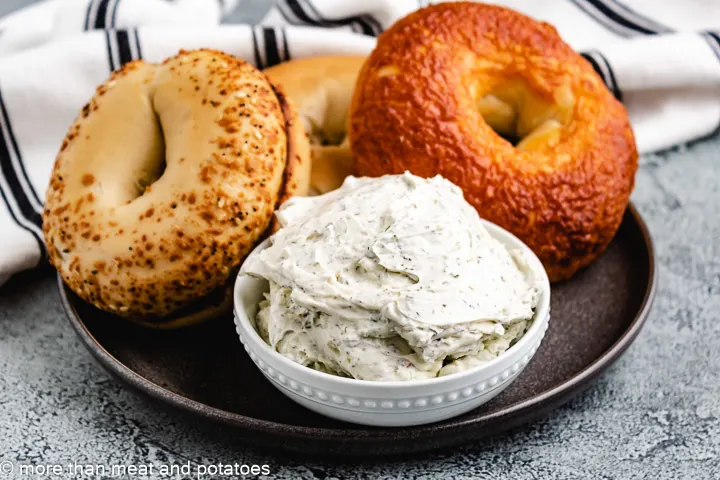 Herb and garlic cream cheese with bagels.