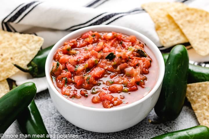 Homemade salsa recipe in a white bowl.