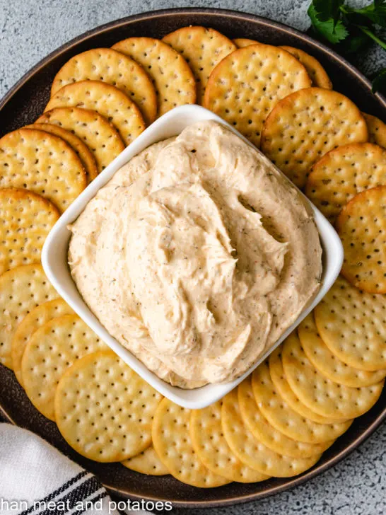 Top down view of ranch dip with crackers.