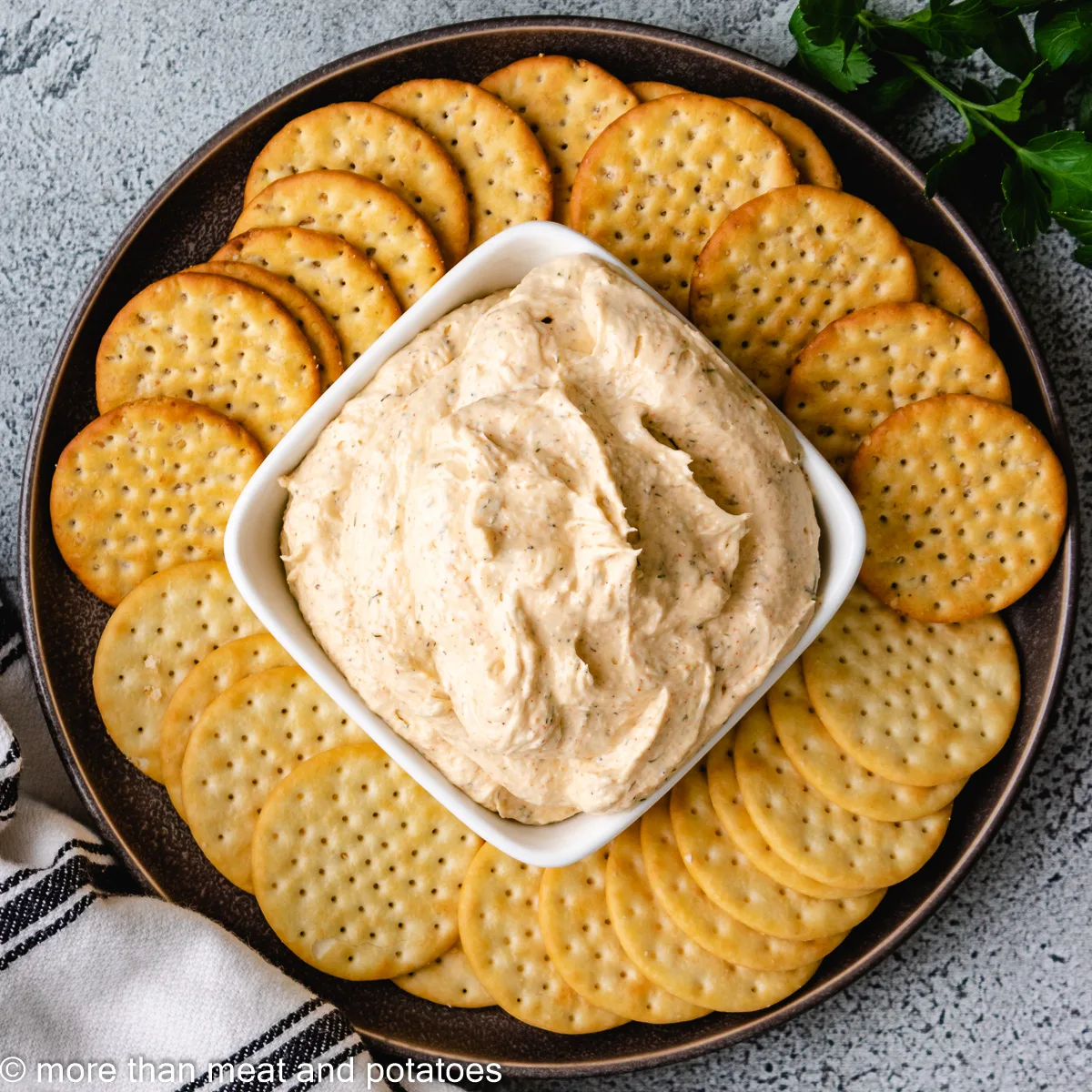 Top down view of ranch dip with crackers.