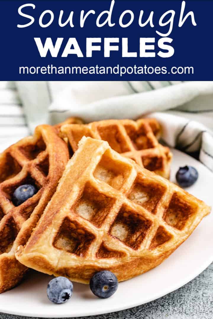Hot waffles with fruit and a napkin.