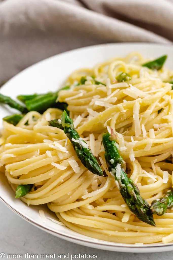 Close up of lemon linguine in a white dish.