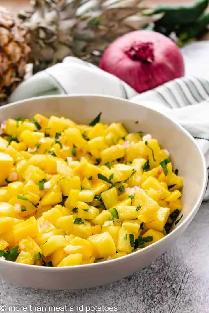 Close up view of pineapple mango salsa.