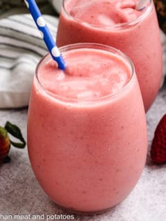 Strawberry smoothies in two glasses.