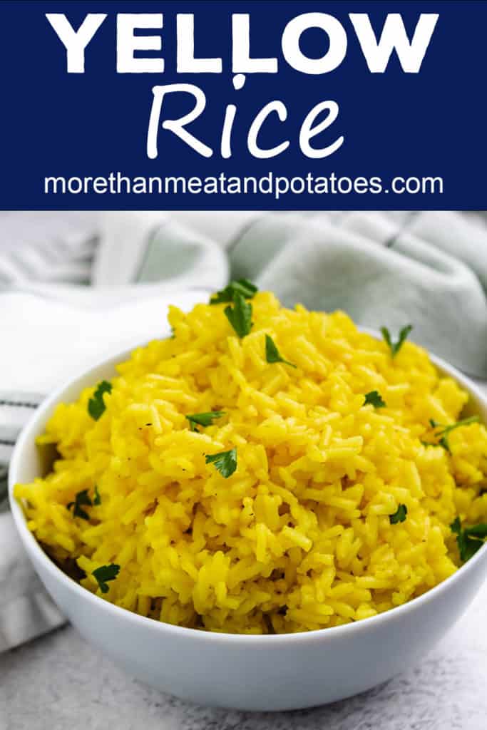 Side view of yellow rice in a light blue bowl.