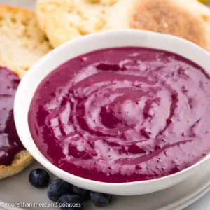 Close up view of fruit curd with bread.