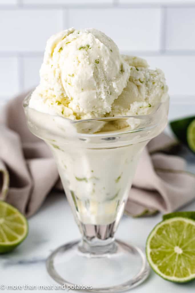 Scoops of lime sherbet in a dessert dish.