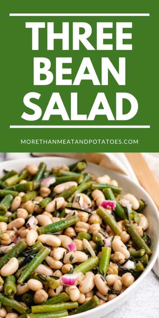 Large serving bowl filled with three bean salad.