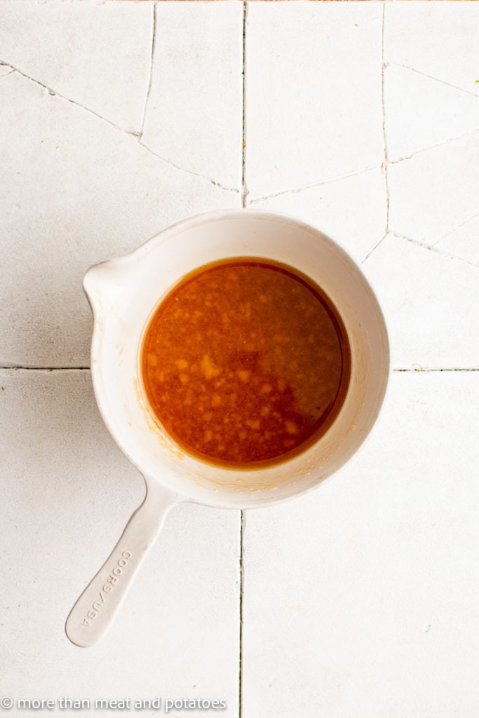 Top down view of asian dressing in a bowl.