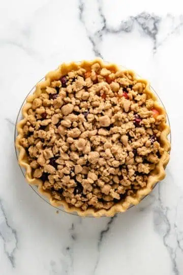 Top down view of unbaked cherry pie.