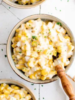 Top down view of a bowl of creamed corn in a bowl.