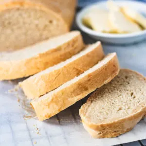 Several pieces of bread on a wire rack.