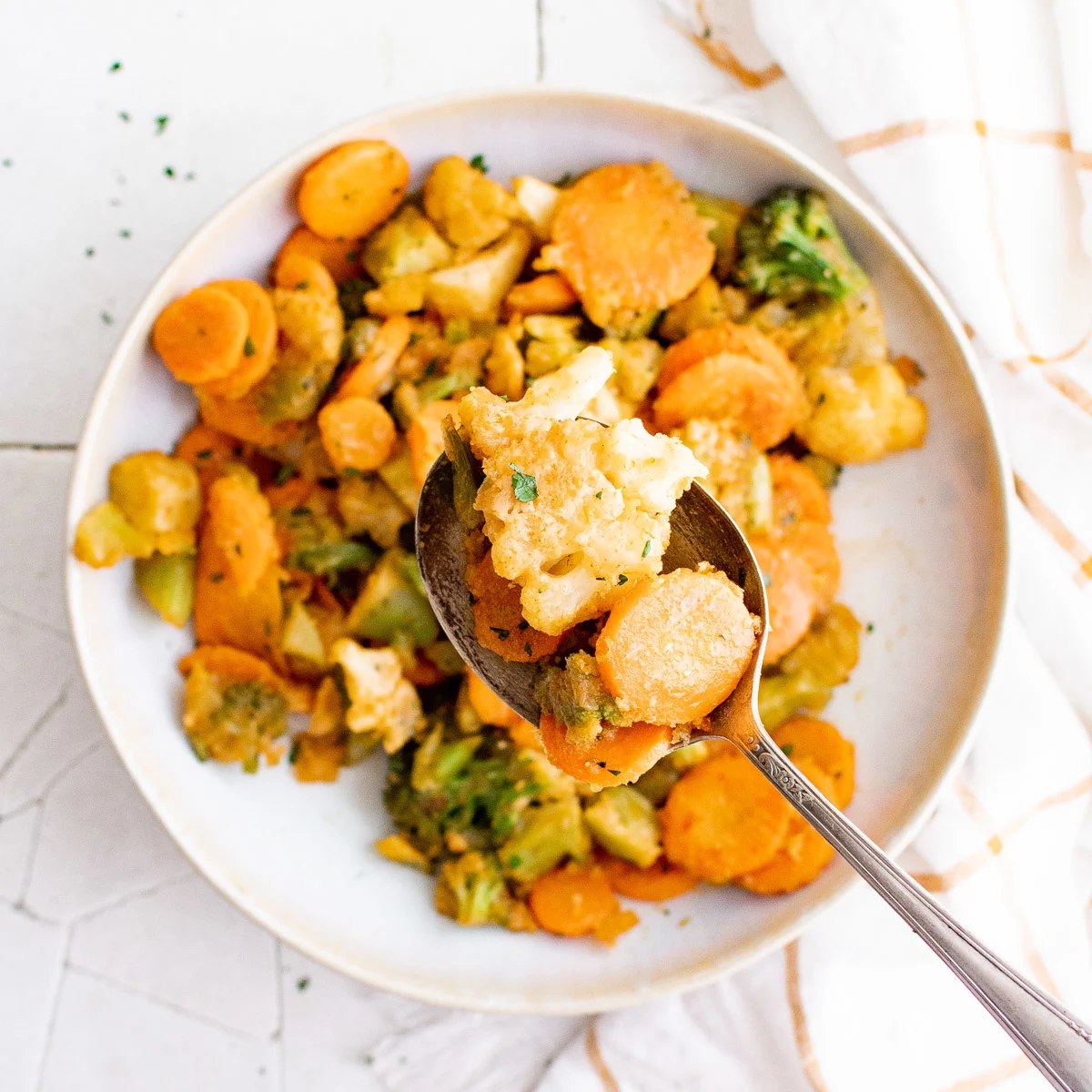 Top down view of a plate roasted frozen vegetables.