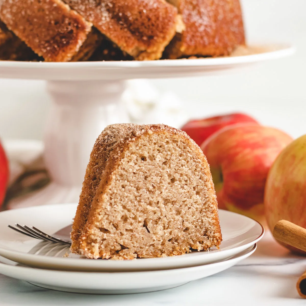 Slice of bundt cake on white plates.