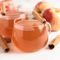 Two cups of fresh apple cider.