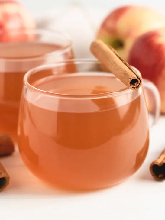 Two cups of fresh apple cider.