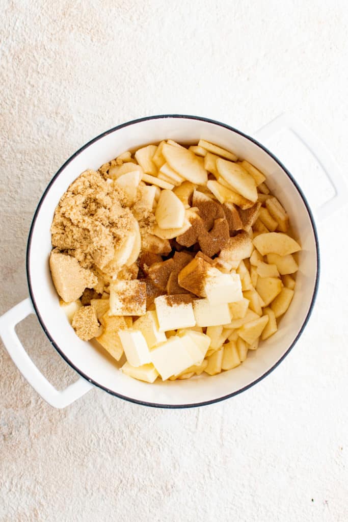 Top down view of ingredient for apple filling in a pan.