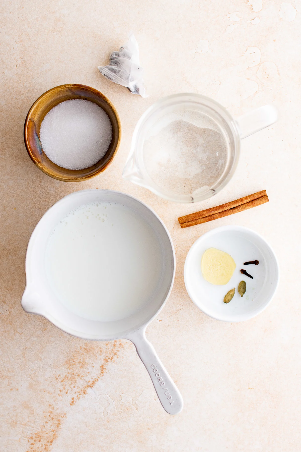 Top down view of ingredients needed for chai latte.