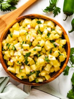 Top down view of jalapeno salsa with diced pineapple.