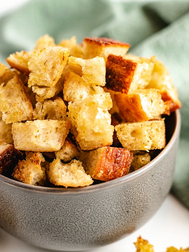 Croutons in a gray bowl.