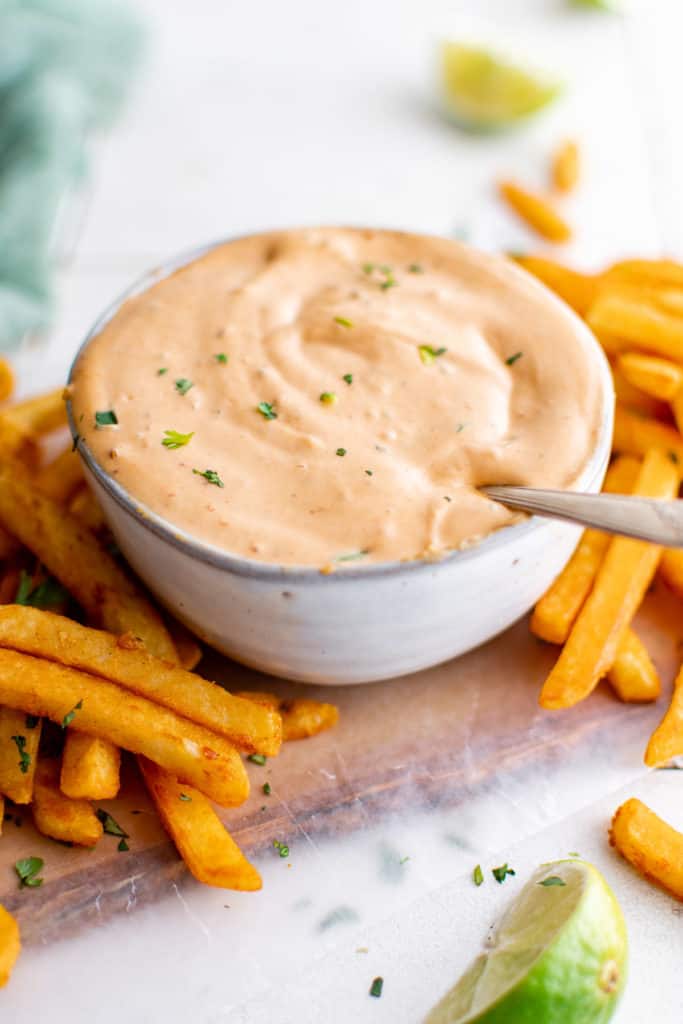 Bowl of chipotle mayo with a spoon.