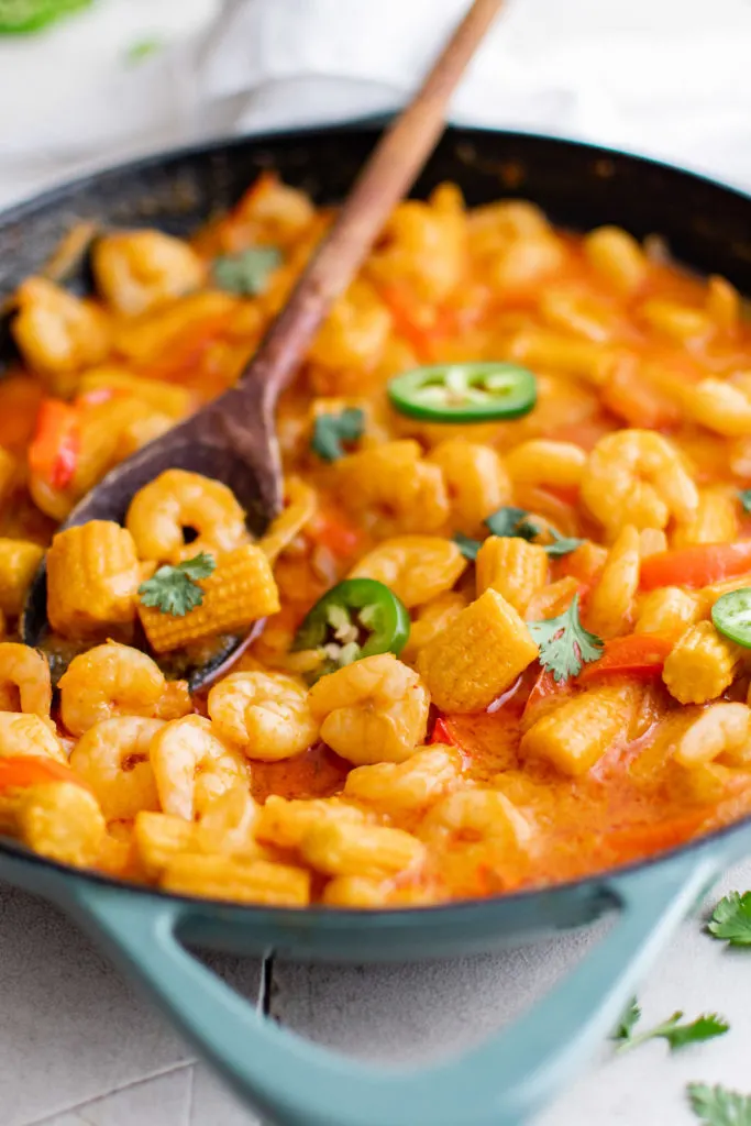 Shrimp curry in a skillet.