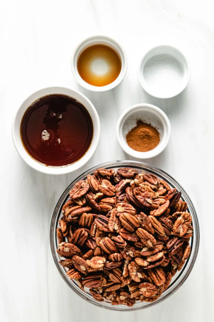 Ingredients needed to make candied pecans.