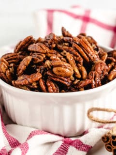 Candied pecans in a serving dish.