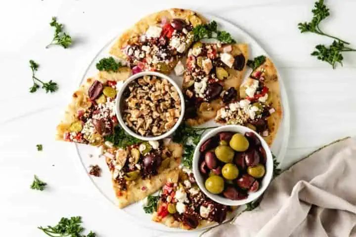 Top down view of a platter of greek bread