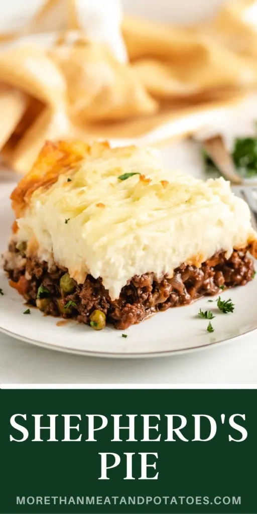 Slice of shepherd's pie on a white dish.