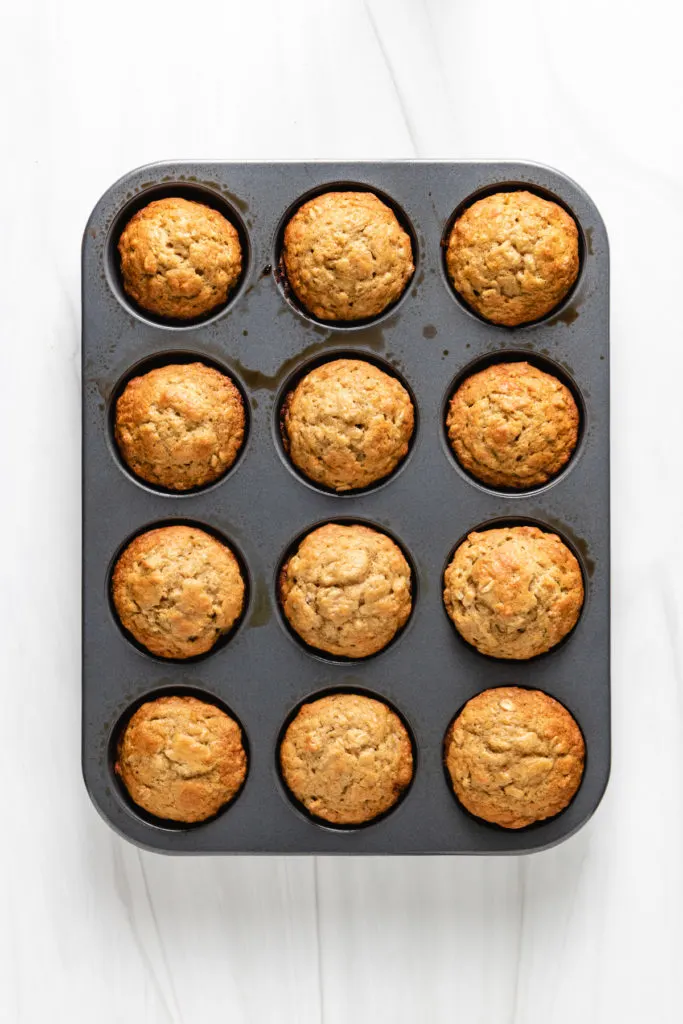 Top down view of banana oatmeal muffins in a pan.