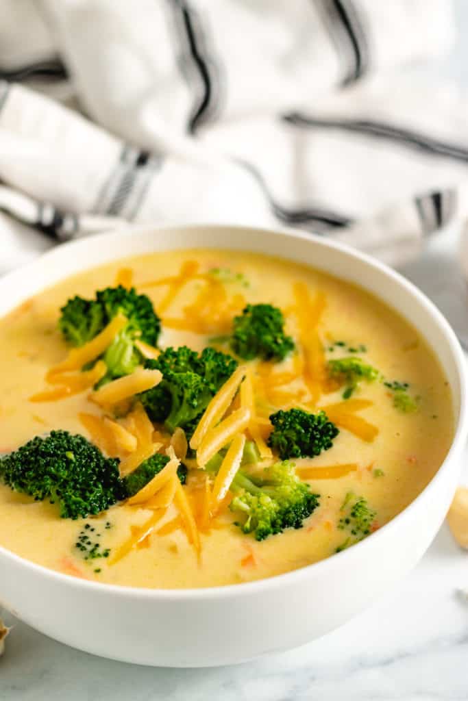 Cheddar and broccoli on top of soup.