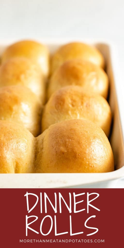 Dinner rolls in a white pan.