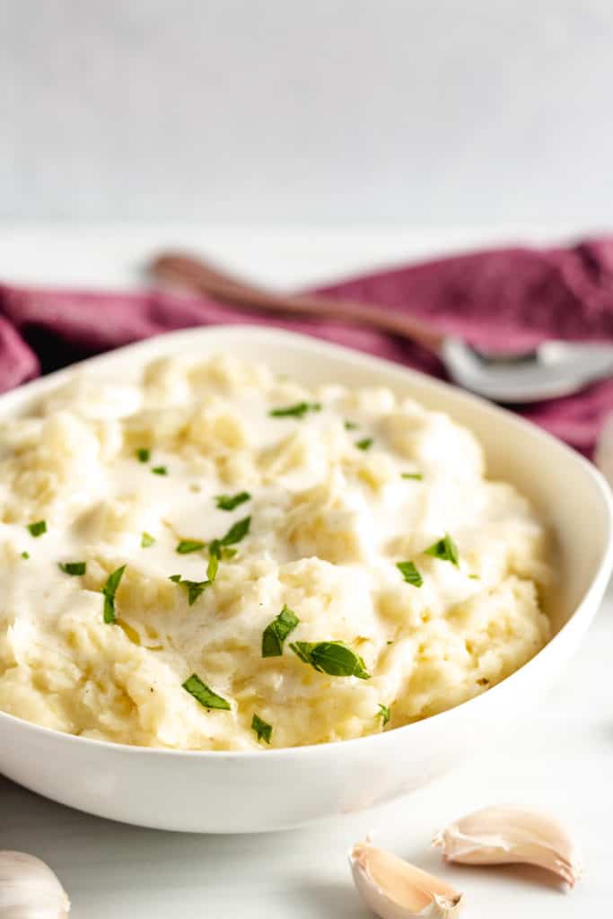 White dish filled with creamy mashed potatoes.