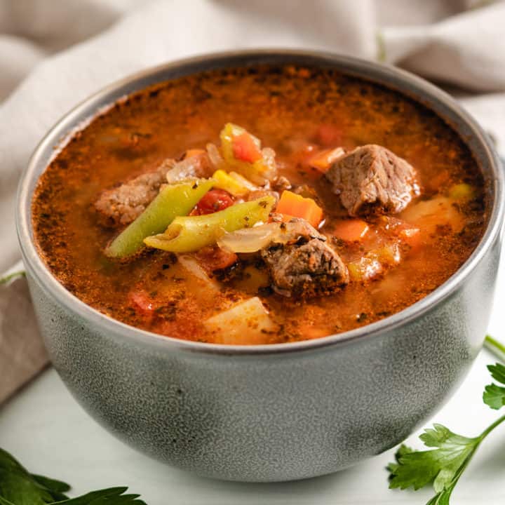 Bowl of vegetable soup with beef. 