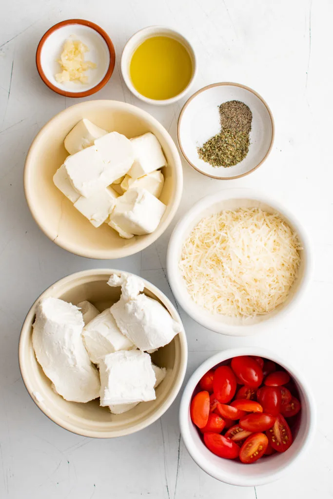 Top down view of ingredients used for baked goat cheese, 