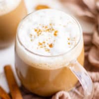 Top down view of gingerbread latte in a mug.