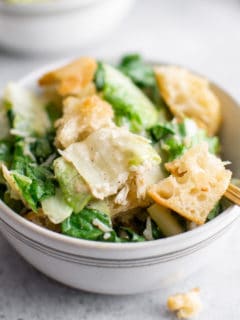 Caesar salad with a fork.