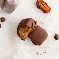 Top down view of date caramels on wax paper.