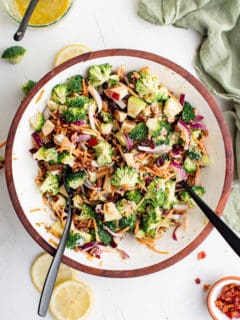 Tossed broccoli salad in a serving bowl.