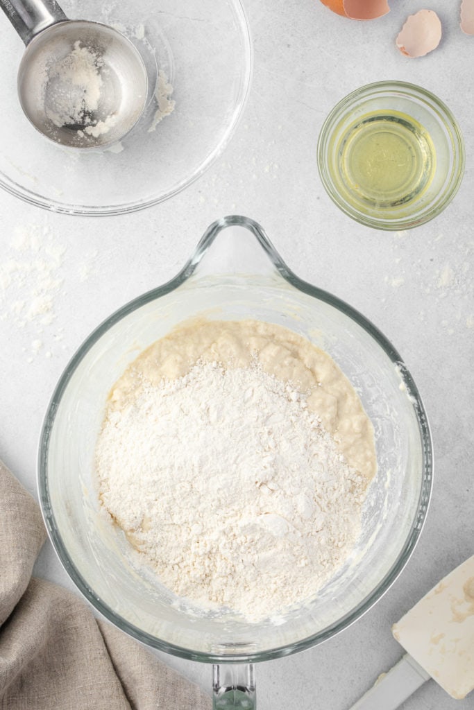 Flour being added to bread dough.